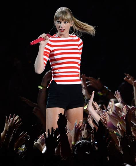 Taylor swift striped top - Swift’s America bikini top has since sold out (though the bottoms are still available). According to ELLE , Solid and Striped enjoyed a 365 percent jump in searches on Lyst j ust after the ...